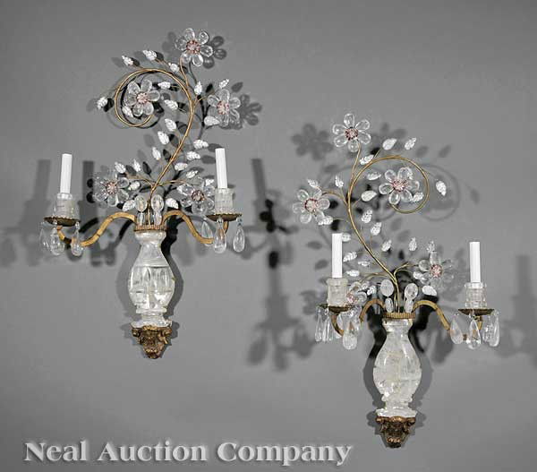 Pair of Louis XVI-Style Rock Crystal Sconces: A Pair of Louis XVI-Style Rock Crystal Sconces, in the style of Maison Bagues, Paris, each vasiform backplate surmounted by a floral spray issuing two scrolling candlearms, hung with pendants, height