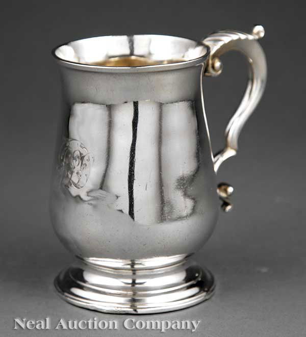 Hester Bateman Sterling Silver Mug: A George III Sterling Silver Mug, Hester Bateman, London, 1782, mark entered 1761, baluster form, leaf capped scrolled handle, stepped circular foot, script monogram, height 4 7/8 in., weight 10.80 tr