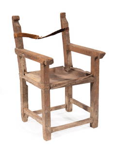 Spanish Colonial Mixed Wood and Leather Chair: Antique Spanish Colonial Mixed Wood and Leather Chair, notched uprights and arms, stretchered base, note: condition, h. 36 in., w. 21 1/2 in., d. 23 in. Provenance: Estate of Highly Acclaimed New