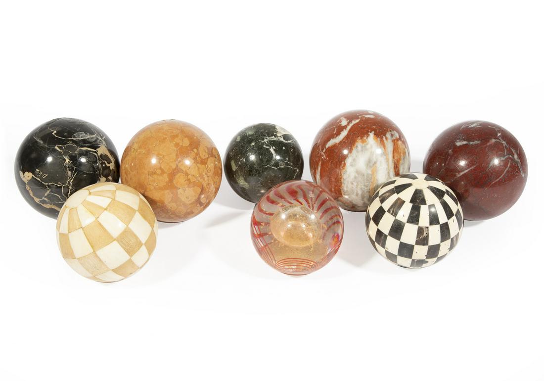 Five Decorative Marble Balls: Five Decorative Marble Balls, largest dia. 4 1/2 in.; together with two bone inlaid balls and a glass paperweight. (8 pcs.) Provenance: Estate of Highly Acclaimed New Orleans Artist, Furniture Maker,