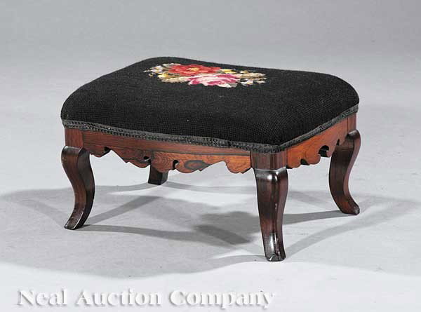 Rococo Carved Rosewood "French" Footstool: An American Rococo Carved Rosewood "French" Footstool, mid-19th c., needlepoint top, serpentine carved skirt, cabriole legs, height 8 in., width 13 in., depth 10 in