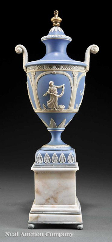 Wedgwood Jasperware Urn: An Antique Wedgwood Jasperware Urn, decorated with classical allegorical figures, mounted on a marble plinth base, brass finial, height 16 3/4 in