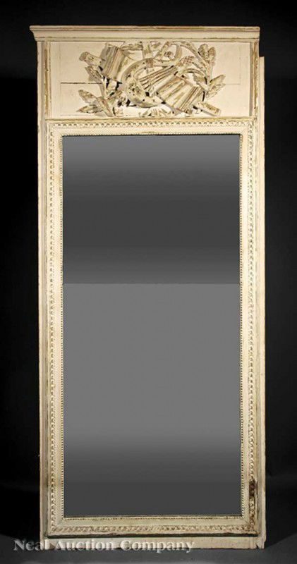 Louis XV-Style Creme Peinte Console and Mirror: An Antique Louis XV-Style Creme Peinte Console and Mirror, late 19th c., divided mirror plate with bead and guilloche frame surmounted by a carved musical trophee panel; demilune table with marble top