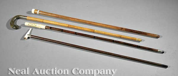 Four English Gadget Canes: Four English Gadget Canes, 19th c., including a bamboo shaft with carved ivory cricket cage; a cane with part of a carved ivory pipe; a "briefcase" cane with bone handle that breaks down into five seg