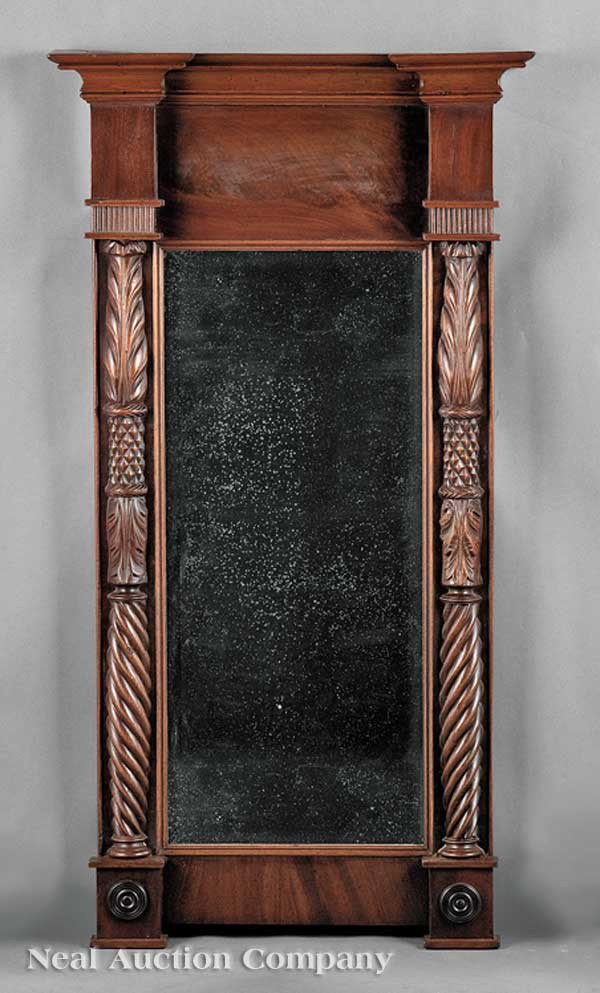 American Classical Carved Mahogany Pier Mirror: An American Classical Carved Mahogany Pier Mirror, early 19th c., molded cornice, blocked corners, paneled frieze, leaf, pineapple and spiral carved half columns, blocked base with boss corners, heigh