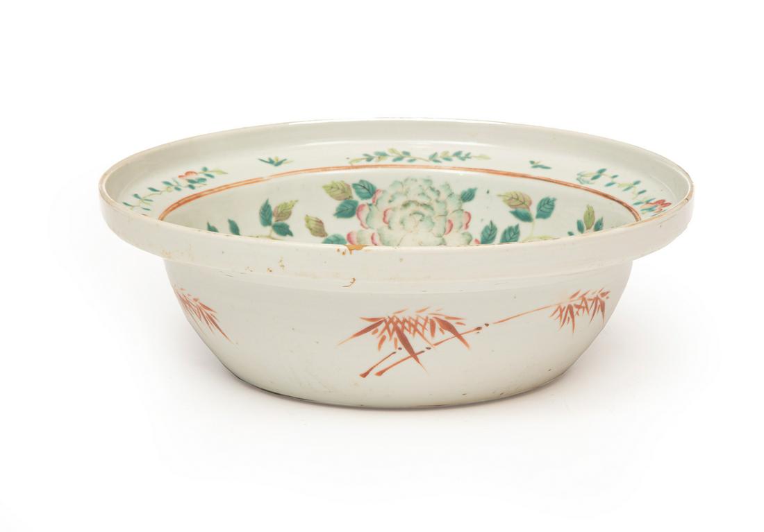 Chinese Export Famille Rose Porcelain Bowl: Chinese Export Famille Rose Porcelain Bowl, 19th c., interior well painted with lotus pond scene, encircled by a peony scroll and ruyi scepter, h. 3 3/4 in., dia. 11 1/2 in.