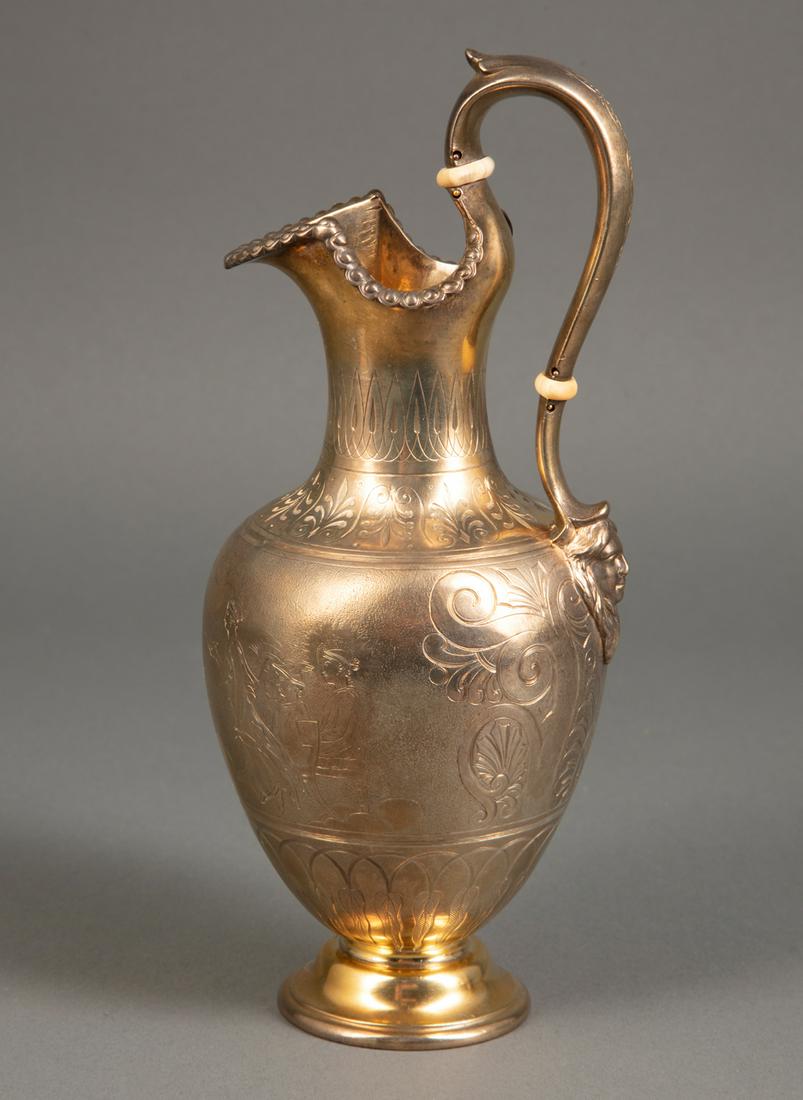 Victorian Sterling Silver Gilt Ewer: Victorian Sterling Silver Gilt Ewer, London, 1850, Edward, John & William Barnard, act. 1846-1851, chased with a frieze depicting Hebe serving wine to the gods at Olympus, neoclassical motifs througho