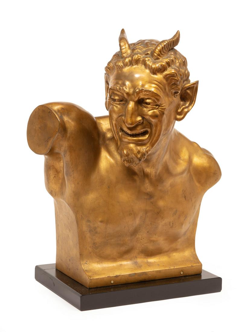 Gilt Bronze Bust of a Satyr: Gilt Bronze Bust of a Satyr, after Morelli, artist name inscribed on truncation, h. 23 in., w. 19 in., d. 13 in., painted wood base, overall h. 24 1/2 in. Provenance: The Collection of Robert Mappleth