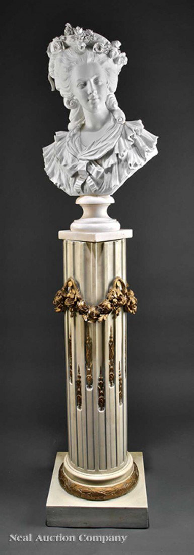 English Parian Bust of a Woman: A Large English Parian Bust of a Woman in French Rococo Dress, late 19th c., with elaborate coiffure and wearing a beribboned straw hat embellished with roses and lilacs, on a marble socle base, set o