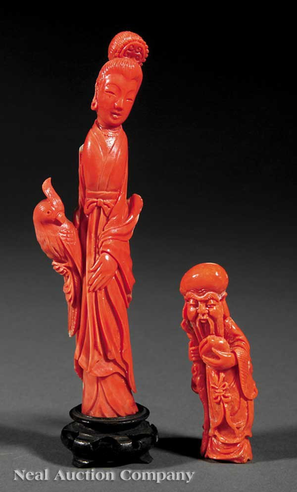 Two Chinese Coral Figures: Two Chinese Coral Figures, the first carved as Shoulao holding a peach in one hand and a staff in the other, height 2 7/8 in., wood stand; the second carved as a beautiful maiden wearing long robes an