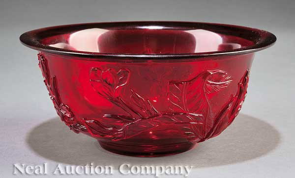Chinese Ruby Red Carved Glass Bowl: A Chinese Ruby Red Carved Glass Bowl, 18th/19th c., U-form body with a wide rim raised on a tapering circular foot ring, relief carved to the exterior sides with flowering branches and butterflies, he