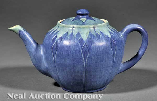 Newcomb College Art Pottery Semi-Matte Teapot: A Newcomb College Art Pottery Semi-Matte Glaze Teapot, 1932, decorated by Sadie Irvine with relief-carved eggplant design, the base marked with Newcomb cipher, decorator's mark, Jonathan Hunt's potter