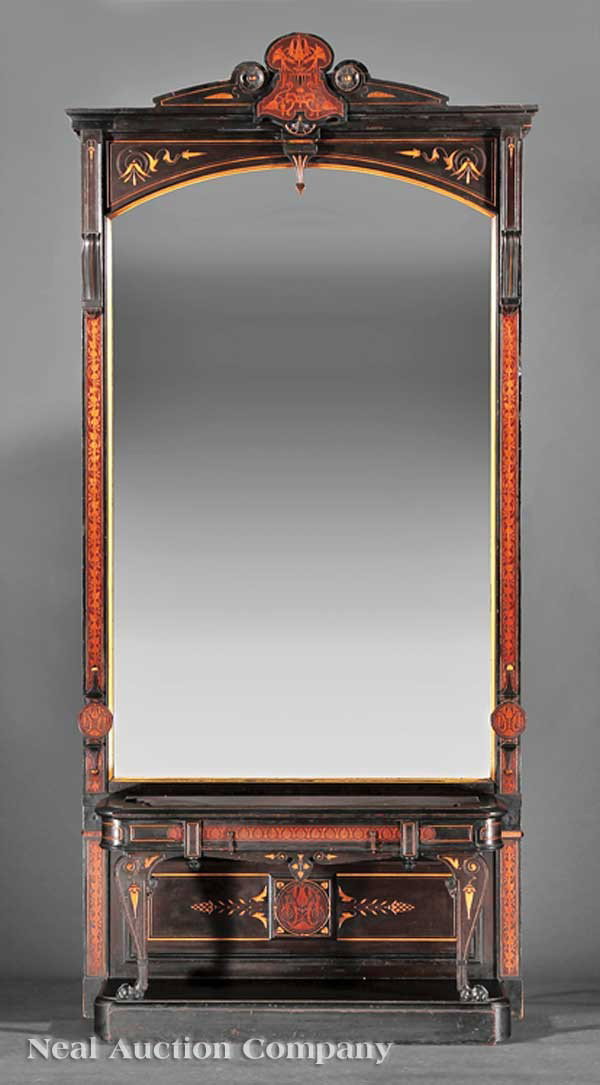 Marquetry, Ebonized, Hall Stand, Herter Bros.: An American Neo-Grec Marquetry, Ebonized and Gilt-Incised Hall Stand, c. 1875, attributed to Herter Bros., New York, the molded cornice surmounted by a bellflower inlaid cartouche, incised panels, mir
