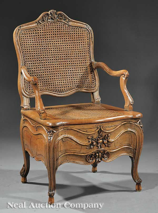 Provincial Carved Walnut and Caned Chaise Percee