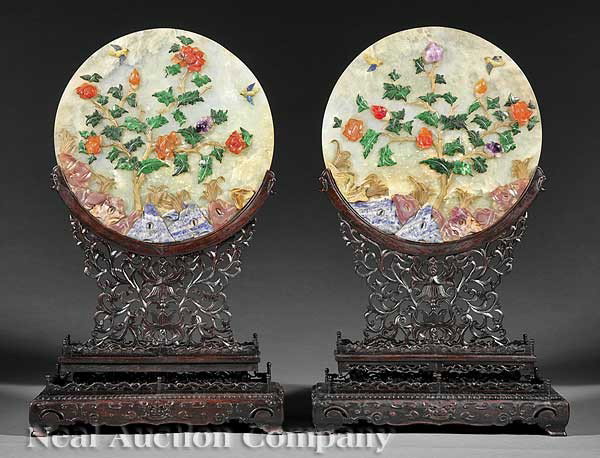 Chinese Hardstone Panels Set as Table Screens: A True Pair of Chinese Hardstone Panels Set as Table Screens, circular hardstone panels embellished with various hardstones including lapis, quartz and malachite to depict fruiting and flowering trees