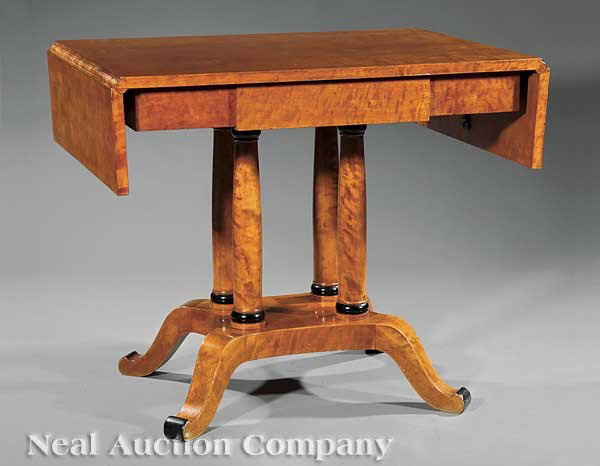 Biedermeier Maple and Ebonized Sofa Table: A Biedermeier Maple and Ebonized Sofa Table, 19th c., fitted with one drawer, columnar supports, incurvate plinth, scrolled legs, height 30 1/2 in., length 51 in., width 27 1/2 in