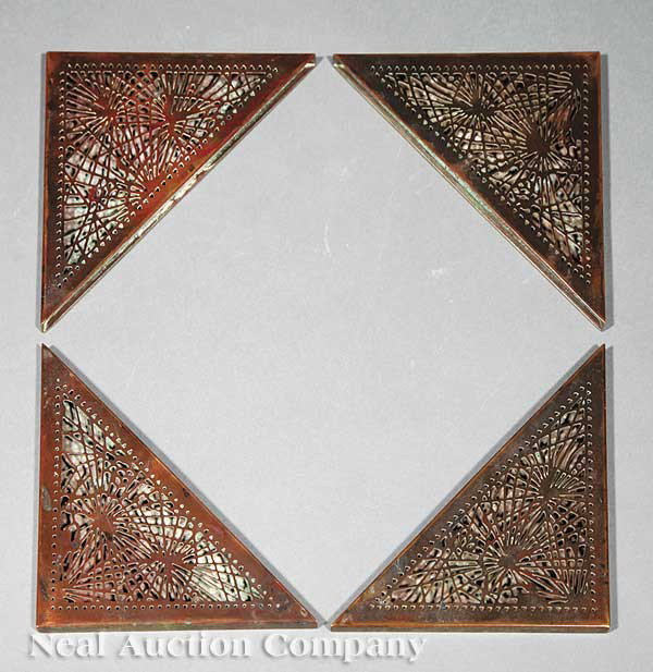 Set of Tiffany Studios Bronze Blotter Corners: A Set of Tiffany Studios Bronze Blotter Corners, c. 1910, in the "Pine Needle" pattern, marked "Tiffany Studios/ New York", length 8 in