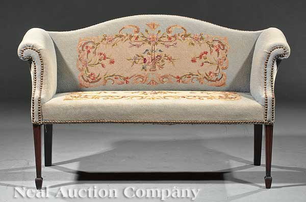 Carved Mahogany Camelback Settee: An Antique Diminutive Carved Mahogany Camelback Settee in the Chippendale Taste, 20th c., shaped back, scroll arms, square molded tapered legs, spade feet, height 28 1/2 in., width 47 1/2 in., depth 2