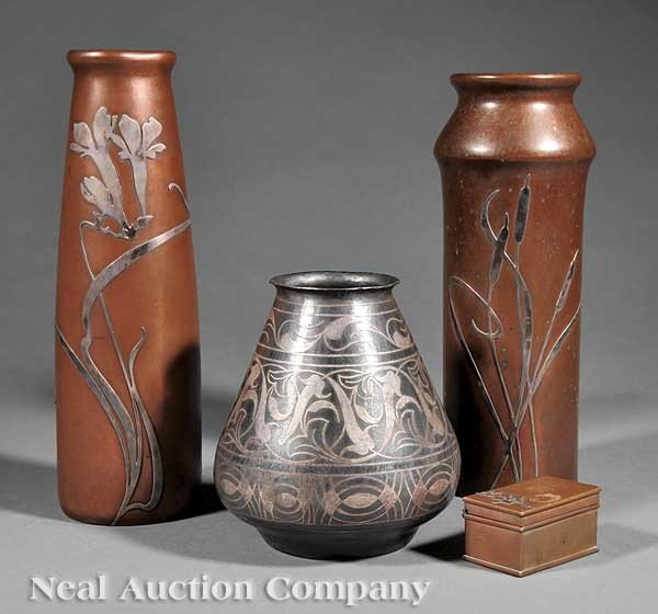 Heintz Bronze and Sterling Silver Overlay Objects: A Group of Three Heintz Bronze and Sterling Silver Overlay Objects, c. 1912, comprising two vases and one box, each fully marked, vase height 10 1/2 in. and 11 in., box height 14 1/2 in., width 2 1/2