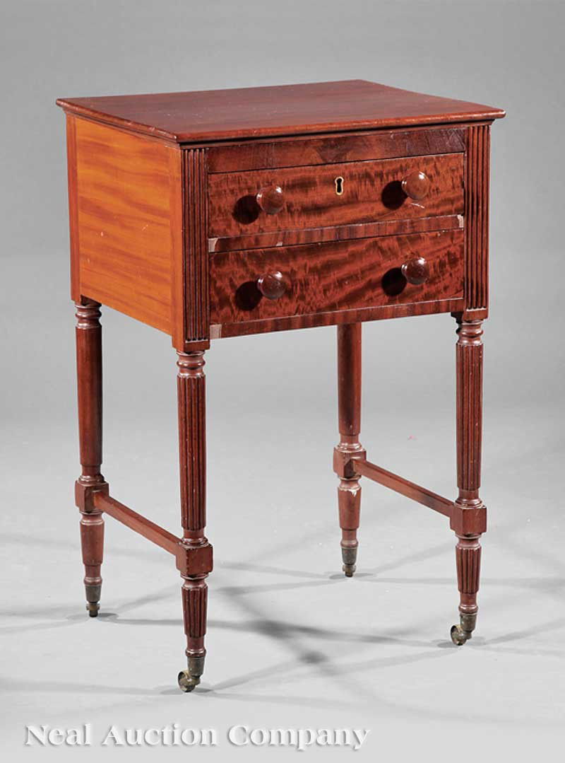 American Federal Carved Mahogany Work Table: An American Federal Carved Mahogany Work Table, c. 1815, New York, School of Duncan Phyfe, the case with two drawers flanked by reeded pilasters, the top drawer opening to fitted interior with baize-l