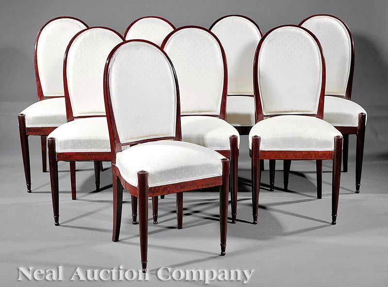French Art Deco Carved Rosewood Side Chairs: A Set of Eight French Art Deco Carved Rosewood Side Chairs, early 20th c., arched backs, shaped seat and rails, turned tapered legs