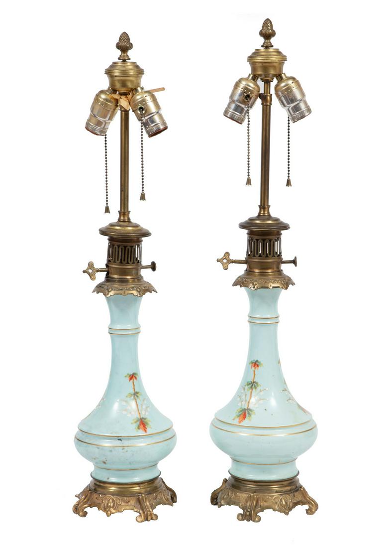 Pair of Antique French Porcelain Carcel Lamps: Pair of Antique French Porcelain Carcel Lamps, celadon ground, enameled floral design, h. (to socket) 25 in.