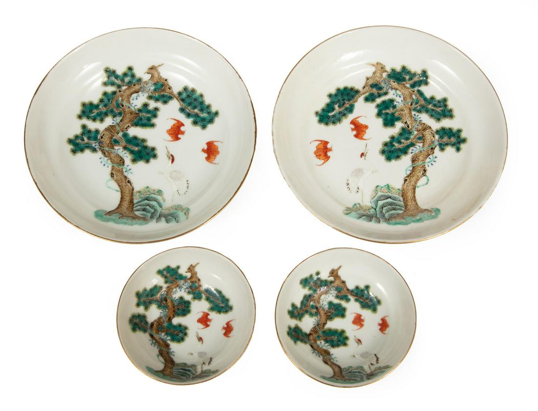 Set of Four Chinese Porcelain Dishes: Set of Four Chinese Porcelain Dishes, probably 20th c., incl. 2 saucers and 2 wine cups, interiors decorated with a pair of bats and a crane beneath a wisteria entwined pine, exteriors with bats, each