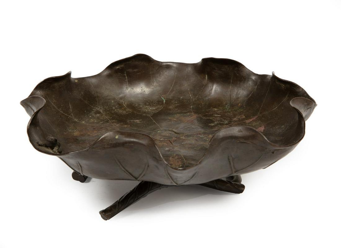 Japanese Bronze Lotus-Form Bowl: Japanese Bronze Lotus-Form Bowl, probably Meiji Period (1868-1912), curled circular leaf form, raised on lotus stem foot, interior edge surmounted by a small frog, h. 3 3/4 in., w. 11 in.