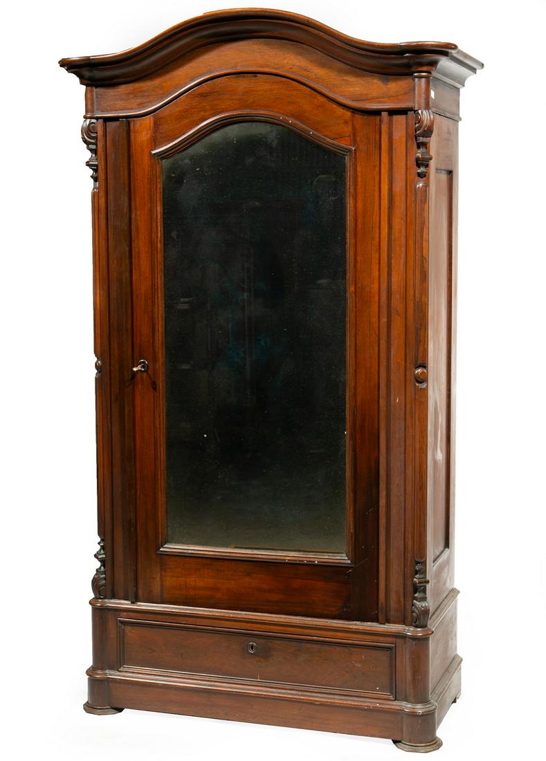 American Renaissance Carved Rosewood Single Door: American Renaissance Carved Rosewood Single Door Armoire, mid-19th c., made for the Southern market, arched cornice, mirrored door, chamfered paneled stiles, shaped base, fitted with drawer, h. 85 1/2