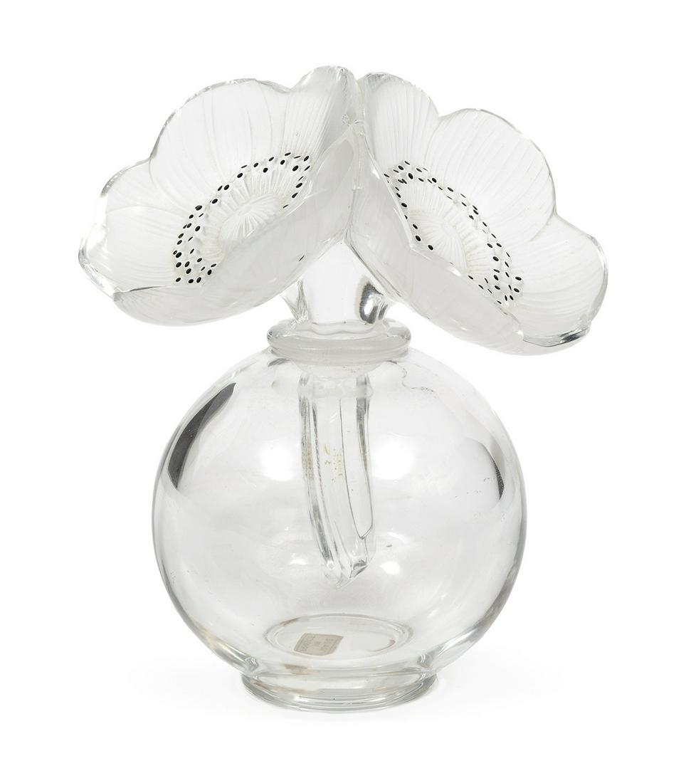 Lalique Crystal "Anemone" Perfume Bottle: Lalique Crystal "Anemone" Perfume Bottle, marked, h. 6 1/2 in. Provenance: The Schoenberger Collection, 1812 Palmer Avenue, New Orleans.