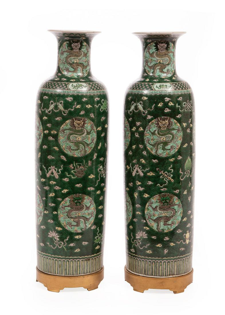 Pair of Chinese Porcelain Sleeve Vases: Pair of Chinese 'Famille Verte' Porcelain Sleeve Vases, 19th/early 20th c., enameled with dragon roundels on a dense fishscale ground strewn with Buddhist emblems, bases with recessed artemisia leaf m