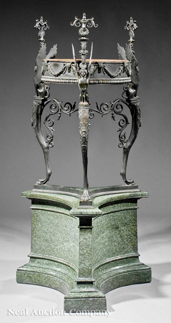 Continental Patinated Bronze, Marble Athenienne: A Fine Continental Patinated Bronze and Marble Athenienne, 19th c., after the Antique, circular copper lined basin, swagged garlands, winged sphinx supports, zoomorphic legs ending in paw feet, incurv