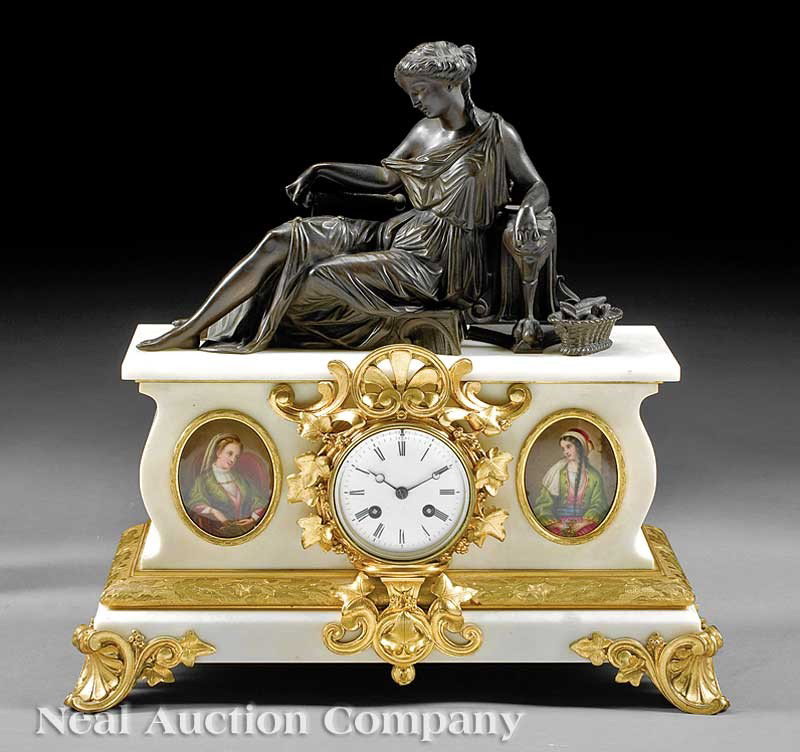 Bronze Dore and White Marble Mantel Clock: A Fine Napoleon III Bronze Dore and White Marble Mantel Clock, works signed "A Brocot et Delattrez Paris", reclining female, white enamel dial between a pair of attractive painted oval porcelain plaqu