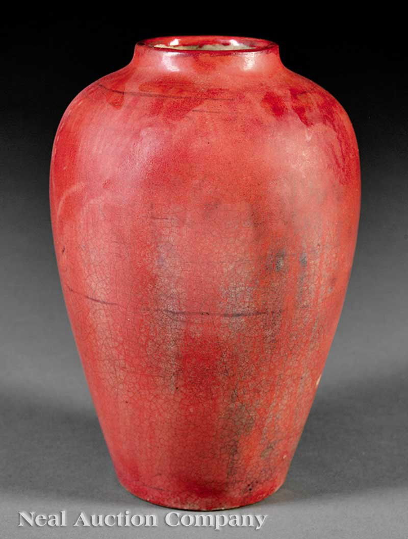 Newcomb College Art Pottery Experimental Vase: A Newcomb College Art Pottery Experimental Vase, c. 1900-10, oxblood over blue glaze liner design faintly visible, copper red vase, base marked with Newcomb cipher and Joseph Meyer's potter's mark, he