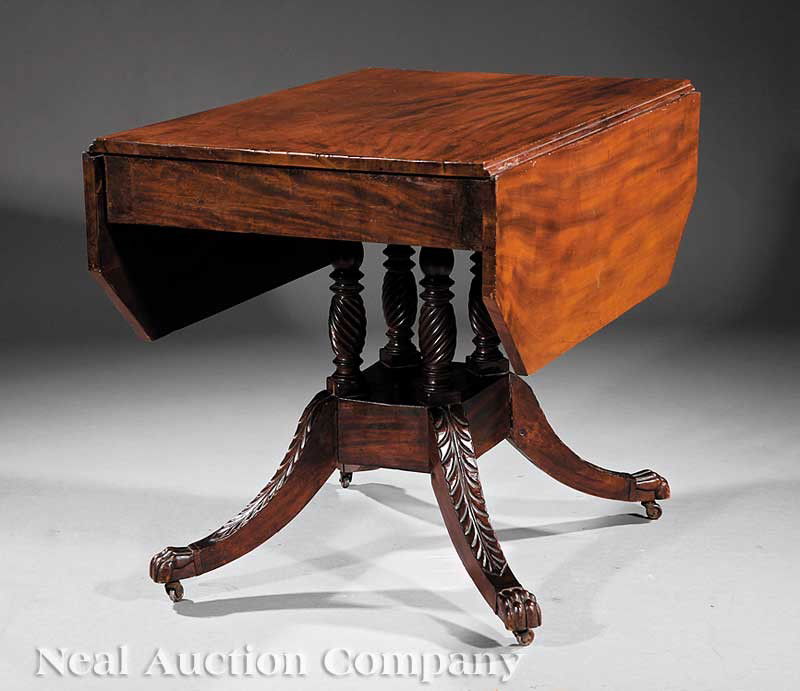 American Federal Carved Mahogany Breakfast Table: An American Federal Carved Mahogany Breakfast Table, early 19th c., New York, in the manner of Duncan Phyfe, shaped drop leaves above a plain skirt, spiral turned supports, rectangular plinth, acanthu