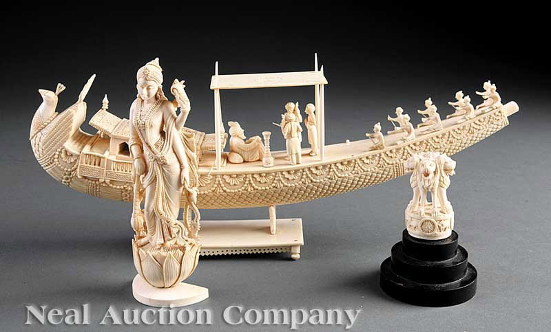 Indian Ivory and Bone Figural Carvings: A Group of Indian Ivory and Bone Figural Carvings, including an ivory finial carved as four conjoined lions standing upon a barrel-form base, relief decorated around the sides with pinwheels and vario