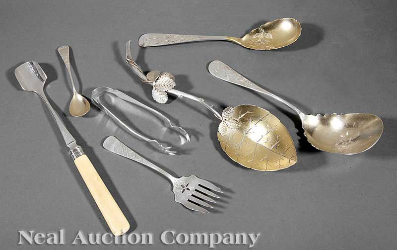 American Aesthetic Silver Serving Pieces: A Group of American Aesthetic Silver Serving Pieces, including a sterling silver berry spoon, a sterling silver serving spoon, a sterling silver egg spoon, a sterling silver sardine fork, a strawberry