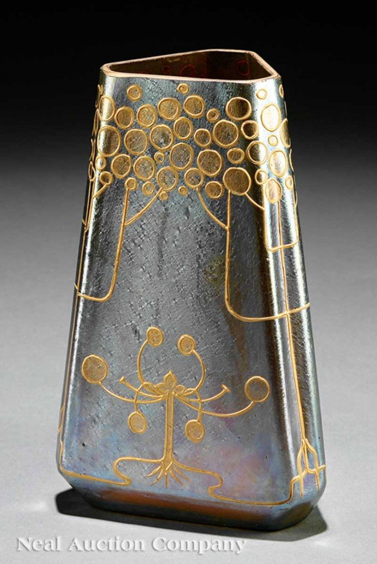 Enameled Iridescent Vase probably Loetz: A Continental Enameled Iridescent Vase, late 19th/early 20th c., probably Loetz, triangular body, applied stylized design, base marked "H67", height 7 1/8 in