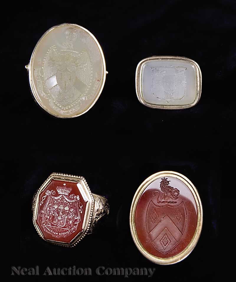 Gold and Gold Plate Carved Stone Intaglio Rings: A Group of Four Antique 14 kt. Gold and Gold Plate Carved Stone Intaglio Rings, comprising: octagonal carnelian in 14 kt. yellow gold; white agate in 14 kt. yellow gold; round carnelian in 14 kt yello