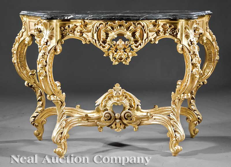 Continental Rococo Giltwood Console: An Antique Continental Rococo Giltwood Console, serpentine marble top, foliate and acanthine skirt centered by a large rocaille cartouche, acanthus carved S scroll legs, stretcher with pierced cartouc