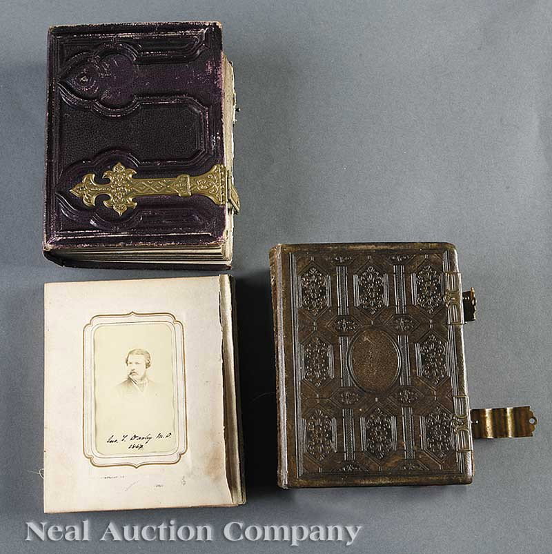 Carte-de-Visite and Photograph Albums: Two Louisiana/Mississippi Carte-de-Visite and Photograph Albums, mid-19th c., two leather bound albums with brass clasps, comprising an album of carte-de-visites and tintypes of Bishop William Elder o