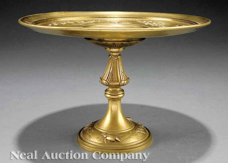 Continental Cast Brass Tazza: An Antique Continental Cast Brass Tazza, c. 1900, the well and base cast with insects, flowers and an inset reserve of herons feeding in the water, height 6 1/2 in., diameter 10 in