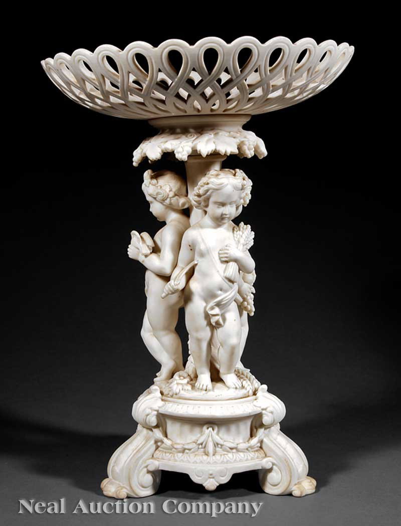 Parian Figural Compote: An Antique Continental Parian Figural Compote, 19th c., reticulated basket, column surmounted by grape vines, allegorical cherubs, base with bellflowers, scrolled feet, height 16 in. diameter 11 in