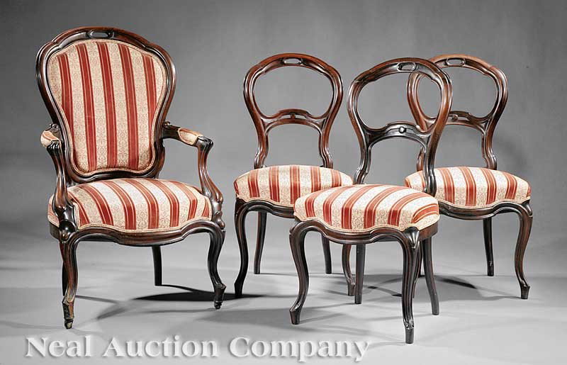 American Rococo Carved Rosewood Parlor Suite: An American Rococo Carved Rosewood Parlor Suite, mid-19th c., comprising three side chairs, armchair and meridienne; all with shaped crest, serpentine seat, cabriole legs, casters; meridienne height 3