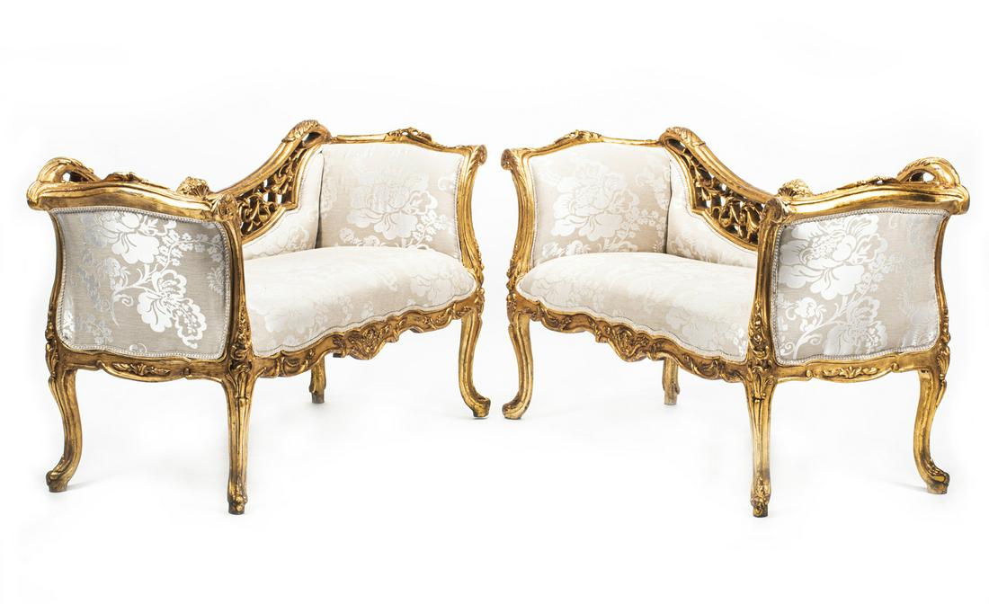 Pair of Louis XV-Style Carved Giltwood Settees: Pair of Louis XV-Style Carved Giltwood Settees, pierced carved crest rail, serpentine seat rail, cabriole legs, h. 34 in., w. 60 in., d. 22 in.