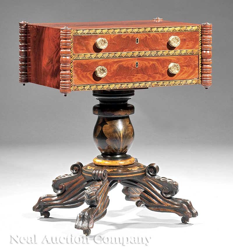 Carved Mahogany and Gilt Stenciled Work Table: A Fine American Classical Carved Mahogany and Gilt Stenciled Work Table, c. 1820, the case with turreted corners, a pair of drawers, one fitted, and stenciled banding; paint-decorated support, circula