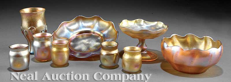 Group of Tiffany Favrile Glass Vessels: A Group of Tiffany Favrile Glass Vessels, 19th c., each engraved "LCT", comprising 5 small glasses, height 1 3/4 in. to 2 1/2 in.; an ice dish, height 1 1/2 in., diameter 6 1/4 in.; a "Queen" finger b