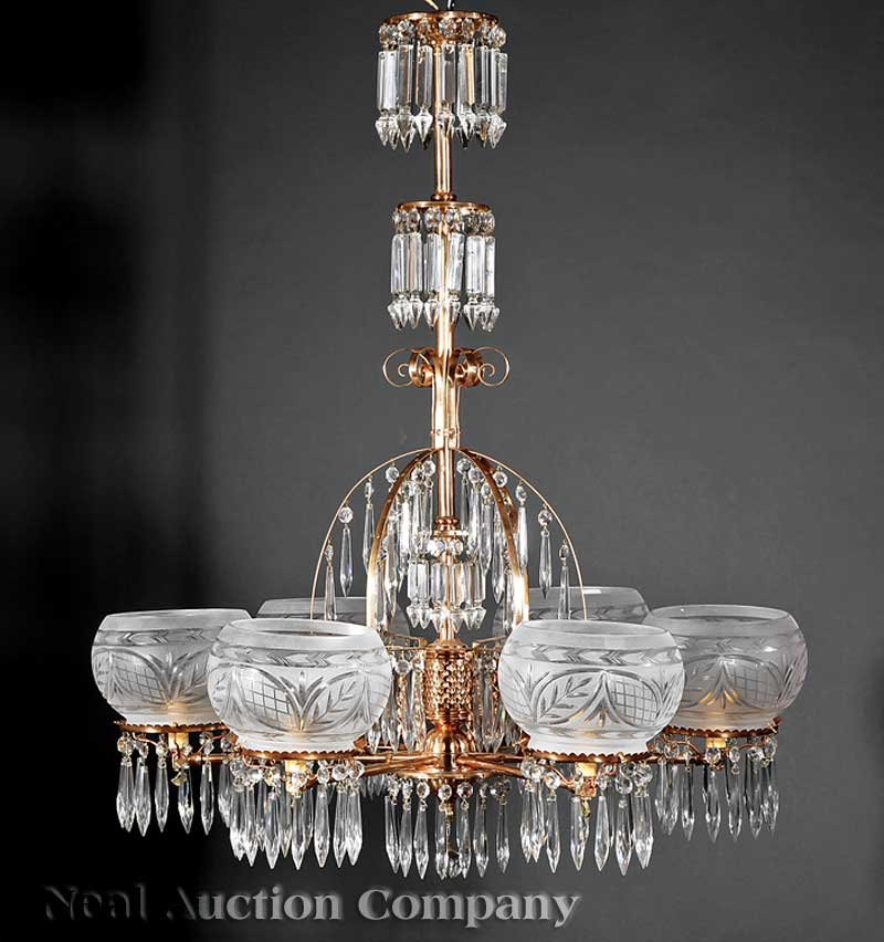 Eastlake Gilt Metal and Brass Six-Light Gasolier: An Eastlake Gilt Metal and Brass Six-Light Gasolier, c. 1890, tiered standard, scrolled supports, hung with spear prisms, with period-style cut and etched shades, electrified, height 37 in., diameter 