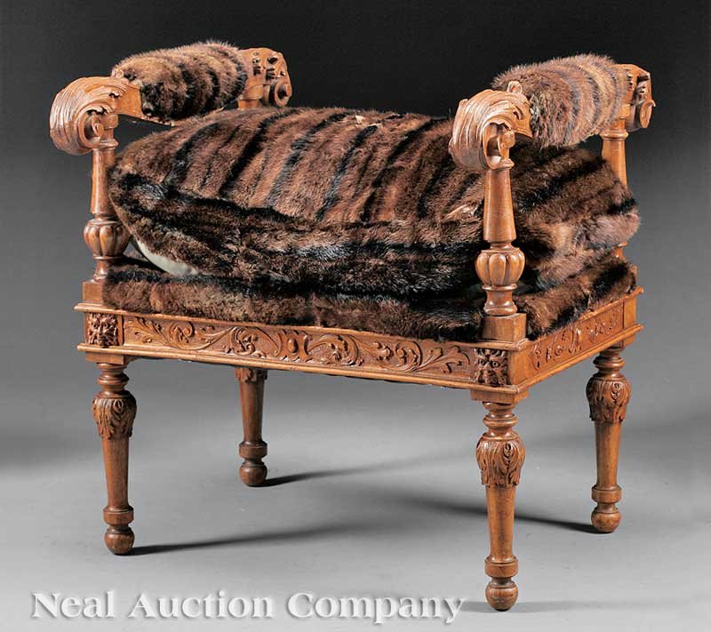 Continental Carved Walnut Window Seat or Bench: A Continental Carved Walnut Window Seat or Bench, 19th c., fanciful pelt upholstery, height 28 1/2 in., width 28 in., depth 24 in