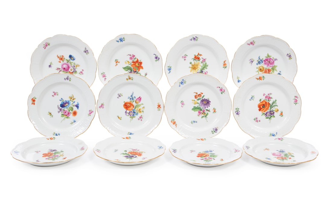 Meissen Floral Porcelain Luncheon Plates: Twelve Meissen Polychrome and Gilt Floral Porcelain Luncheon Plates, blue crossed swords mark, various impressed numbers, scalloped gilt rims, basketweave borders, dia. 7 5/8 in.
